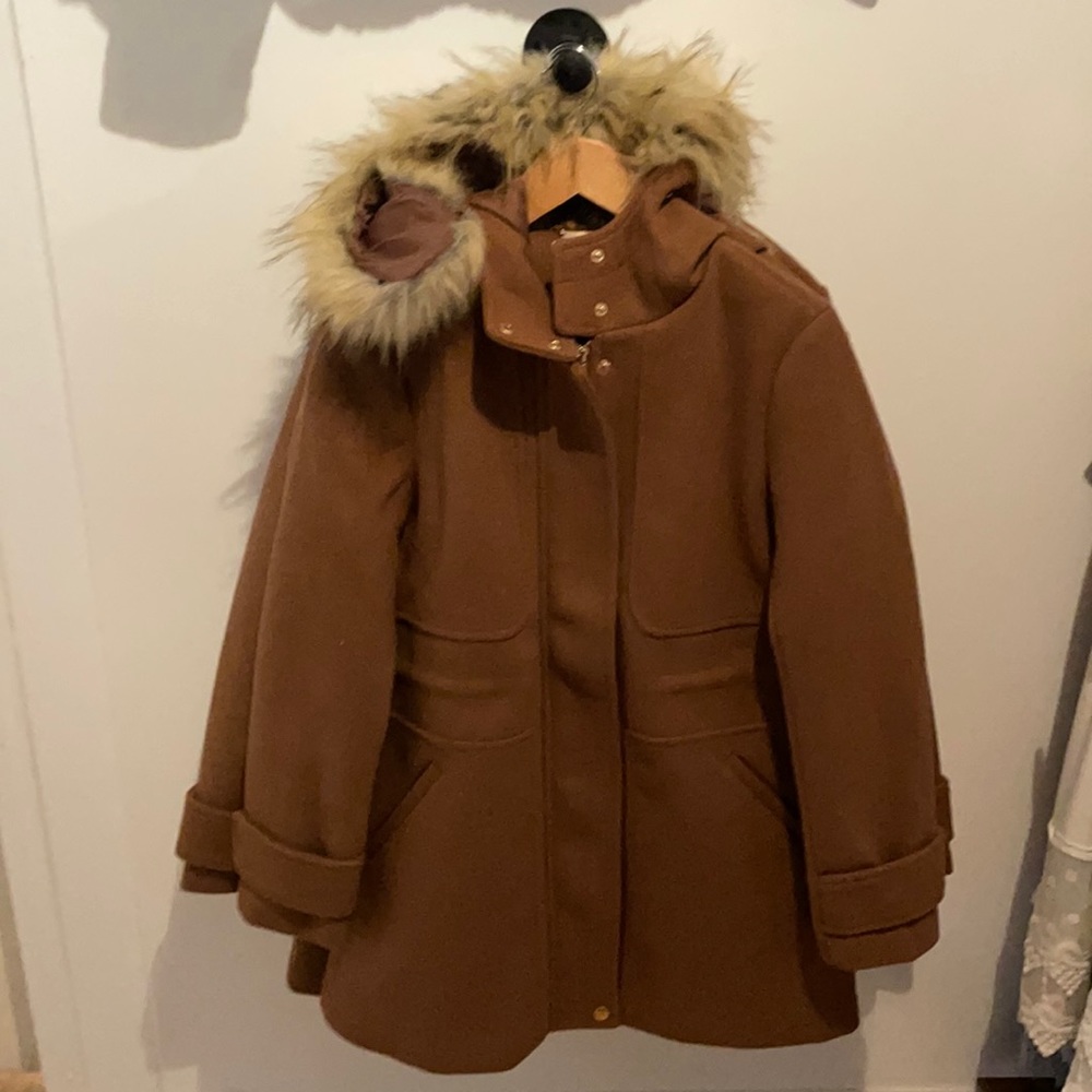 Coat with faux fur hood.